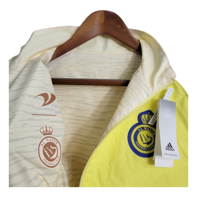 Jaqueta Corta-Vento Al-Nassr 23/24 dupla face - Masculina Dunes - Amarela com detalhes em azul