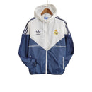 Jaqueta Corta-Vento Real Madrid 23/24 - Masculina Adidas - Azul e branca
