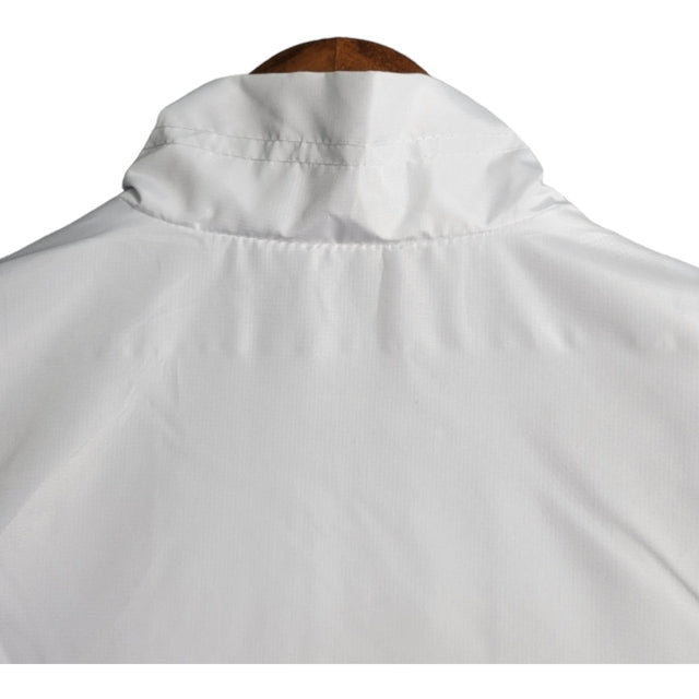 Jaqueta Corta-Vento Manchester United 23/24 - Masculina Adidas - Branca com detalhes em azul e preto