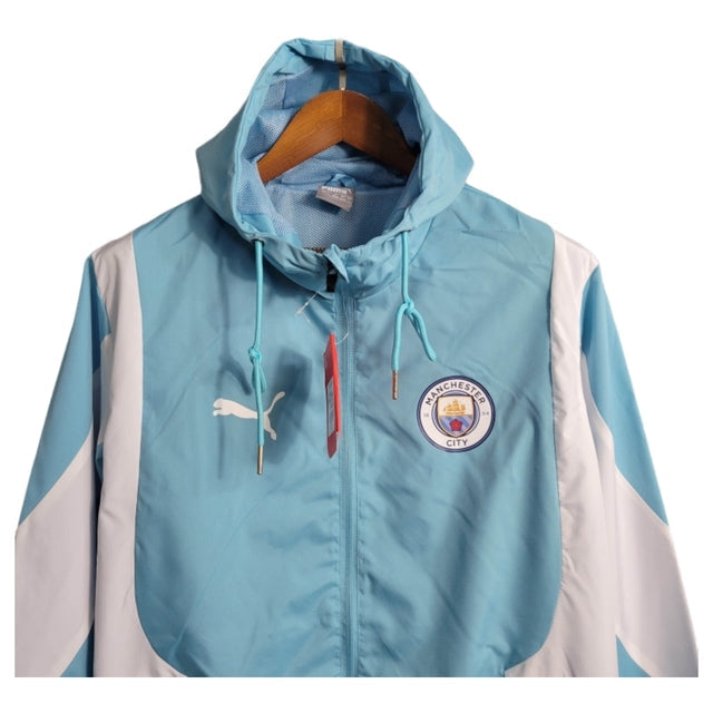 Jaqueta Corta-Vento Manchester City 23/24 - Masculina Puma - Azul com detalhes em branco