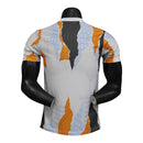 Camisa Real de Madrid Pré-jogo 24/25 - Jogador Adidas Masculina - Branca com detalhes em laranja e preto e azul