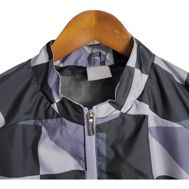 Jaqueta Corta-Vento Manchester City 23/24 - Masculina Puma - Preta e roxa