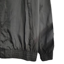 Jaqueta Corta-Vento Barcelona 23/24 - Preta com detalhes em vermelho e branco