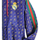 Jaqueta Corta-Vento Real Madrid 23/24 - Masculina Adidas colab com Gucci - Azul com detalhes em amarelo e verde e vermelho