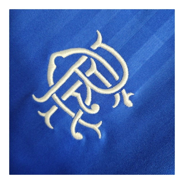 Kit Infantil Rangers Clube I 23/24 - Castore - Azul com detalhes em branco