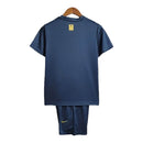 Kit Infantil Al-Nassr I Nike 23/24 - Azul com detalhes em dourado