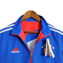 Jaqueta Corta-Vento Bayern de Munique 23/24 dupla face - Masculina Adidas - Azul com detalhes em vermelho
